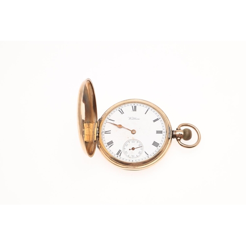 908 - AN 18CT GOLD OPEN FACED POCKET WATCH. the foliate engraved dial with Roman numerals, metal inner cas... 