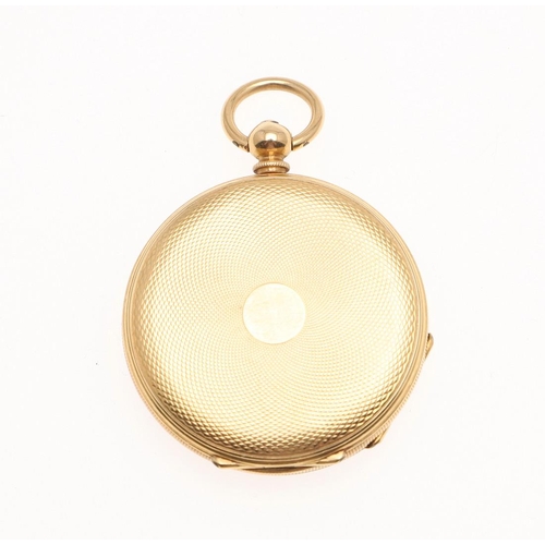 908 - AN 18CT GOLD OPEN FACED POCKET WATCH. the foliate engraved dial with Roman numerals, metal inner cas... 