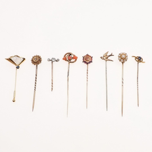 922 - A PEARL CLUSTER STICK PIN AND SEVEN FURTHER STICK PINS. Eight gold stick pins including pearl cluste... 