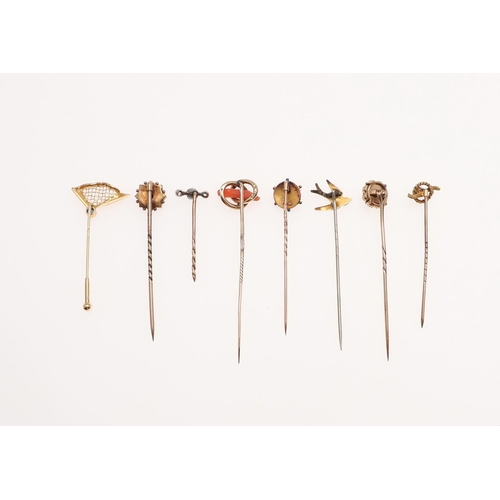 922 - A PEARL CLUSTER STICK PIN AND SEVEN FURTHER STICK PINS. Eight gold stick pins including pearl cluste... 