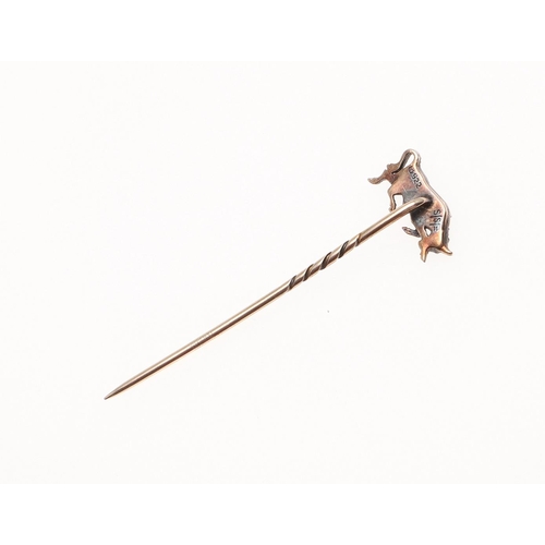 924 - A VICTORIAN DIAMOND STICK PIN. in the form of a charging bull, set with rose-cut diamonds, with cabo... 