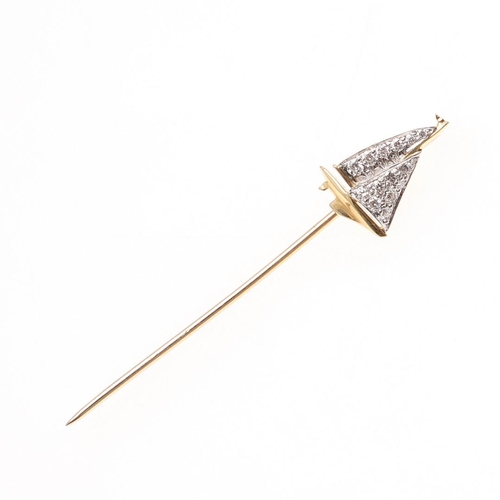 925 - AN AMERICAN DIAMOND, GOLD AND PLATINUM YACHT STICK PIN BY MCTEIGUE. mounted with circular-cut diamon... 