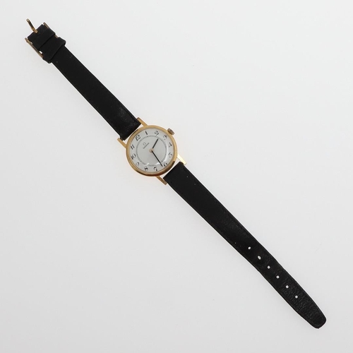 934 - A LADY'S 9CT GOLD WRISTWATCH BY OMEGA. the signed square-shaped dial with baton numerals, the winder... 