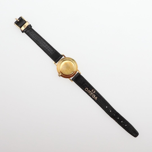 934 - A LADY'S 9CT GOLD WRISTWATCH BY OMEGA. the signed square-shaped dial with baton numerals, the winder... 