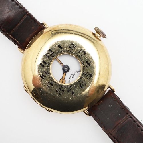 947 - AN 18CT GOLD OFFICER'S TRENCH WATCH 1ST WORLD WAR, CIRCA 1915. the white enamel dial with Arabic num... 