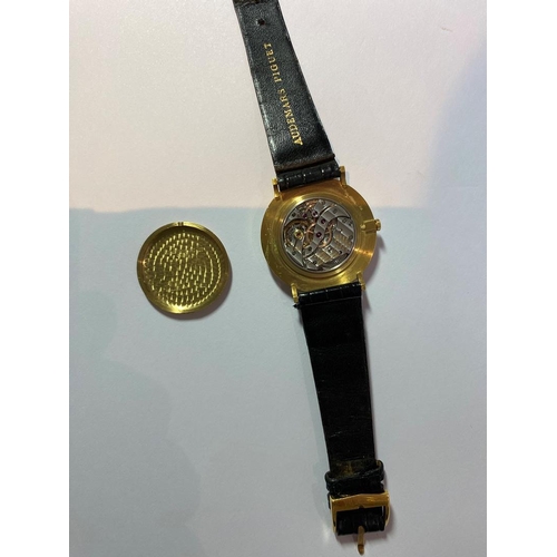 959 - A GENTLEMAN'S 18CT GOLD MECHANICAL WRISTWATCH BY AUDEMARS PIGUET. the signed circular dial with bato... 