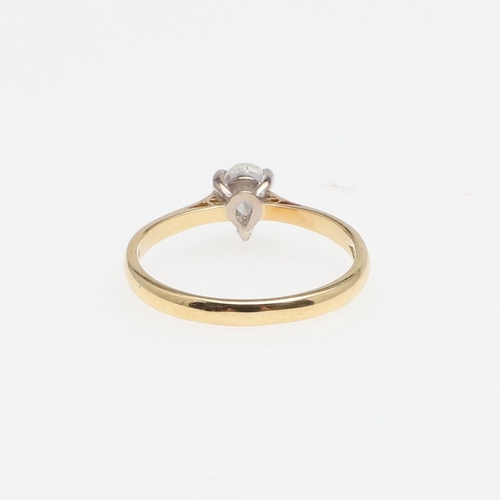 970 - A DIAMOND SOLITAIRE RING. mounted with a pear-shaped diamond, in 18ct gold, 2.4 grams. Size O.  *Con... 