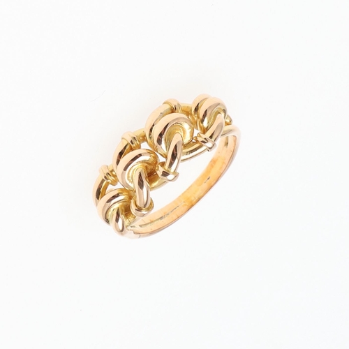 979 - AN 18CT GOLD TWIST RING. 5.7 grams. Size L.  *Condition:  A small repair to the shank, otherwise no ... 