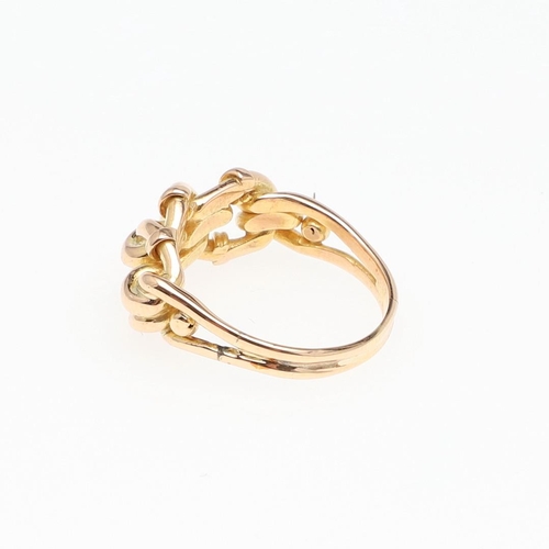 979 - AN 18CT GOLD TWIST RING. 5.7 grams. Size L.  *Condition:  A small repair to the shank, otherwise no ... 