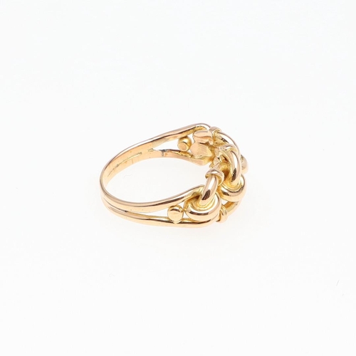 979 - AN 18CT GOLD TWIST RING. 5.7 grams. Size L.  *Condition:  A small repair to the shank, otherwise no ... 