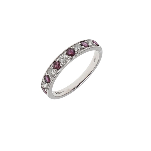 980 - A RUBY AND DIAMOND HALF HOOP RING. mounted alternately with circular-cut rubies and diamonds, in 18c... 