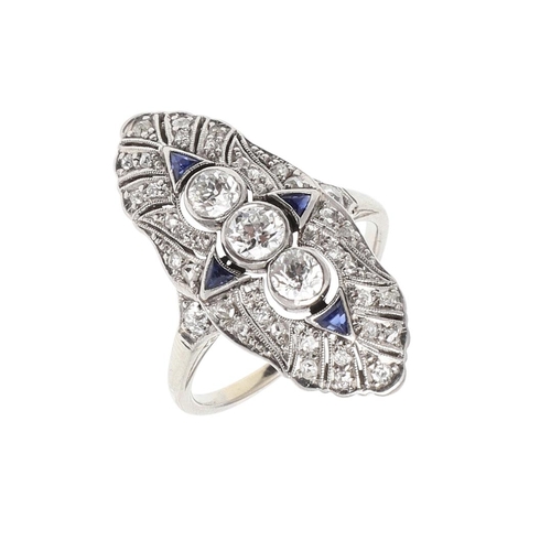 981 - A SAPPHIRE AND DIAMOND CLUSTER RING. the lozenge-shaped ring is mounted with three collet-set circul... 