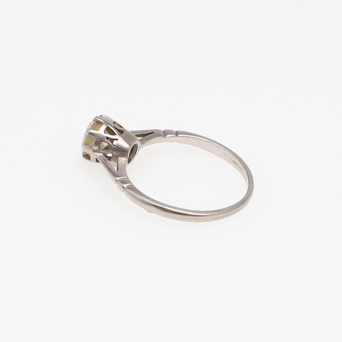 992 - A DIAMOND SOLITAIRE RING. mounted with a circular old-cut diamond, in platinum, 2.6 grams. Size M 1/... 