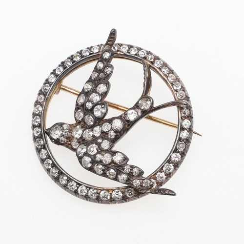 996 - A VICTORIAN DIAMOND SWALLOW BROOCH. set overall with old-cut and rose-cut diamonds in silver and gol... 