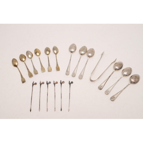 100 - THREE CASED SETS. a George V cased set of six silvergilt teaspoons, with beaded & enamelled terminal... 