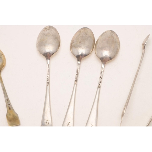 100 - THREE CASED SETS. a George V cased set of six silvergilt teaspoons, with beaded & enamelled terminal... 