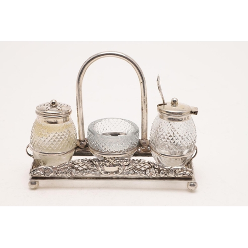 133 - A LATE VICTORIAN CRUET FRAME. rectangular outline, with embossed sides, associated mounted glass sal... 