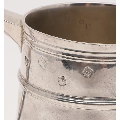 141 - AN ELIZABETH II MUG. of tapering form, with an applied reeded girdle and a 'S'-scroll handle, initia... 