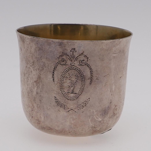 166 - A GEORGE III BEAKER. of circular form, with a slightly everting rim,  engraved with a crest and mott... 