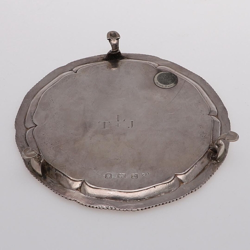 167 - A GEORGE III WAITER. of shaped circular outline, with a gadrooned border, engraved in the centre wit... 