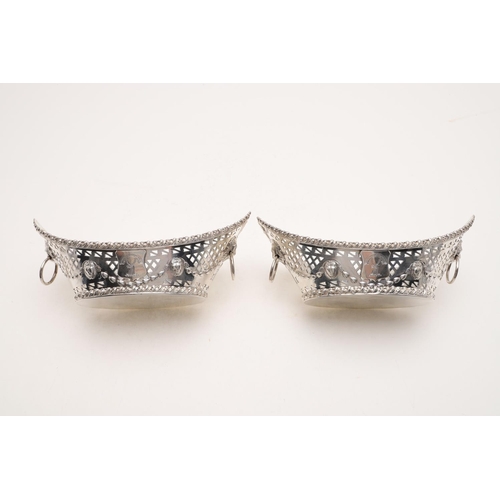 175 - A PAIR OF EDWARDIAN NAVETTE-SHAPED BASKETS. with gadrooned borders, pierced sides &  twin lion-mask ... 