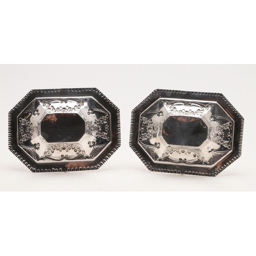 179 - A PAIR OF VICTORIAN SWING-HANDLE SWEETMEAT BASKETS. octagonal outline, with a punched border and the... 