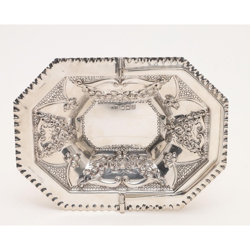 179 - A PAIR OF VICTORIAN SWING-HANDLE SWEETMEAT BASKETS. octagonal outline, with a punched border and the... 