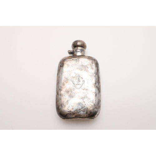 186 - A GEORGE V RECTANGULAR SPIRIT FLASK. with rounded corners, a hinged twist cap, crested & inscribed, ... 