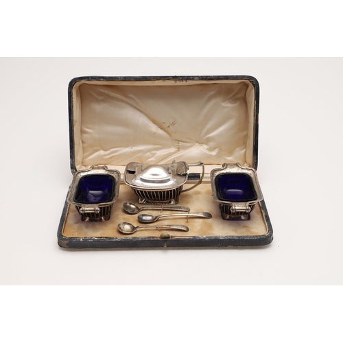 199 - A GEORGE V THREE-PIECE CASED CONDIMENT SET. rounded rectangular form with ribbon & reed borders, wir... 