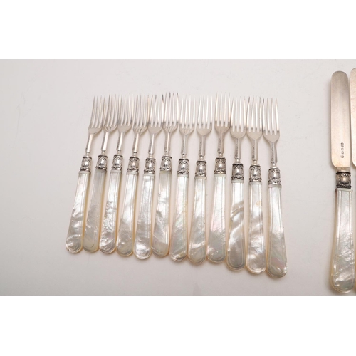 20 - A VICTORIAN SET OF TWELVE PAIRS OF MOTHER-OF-PEARL HANDLED FRUIT KNIVES & FORKS. by Henry Wilkinson ... 