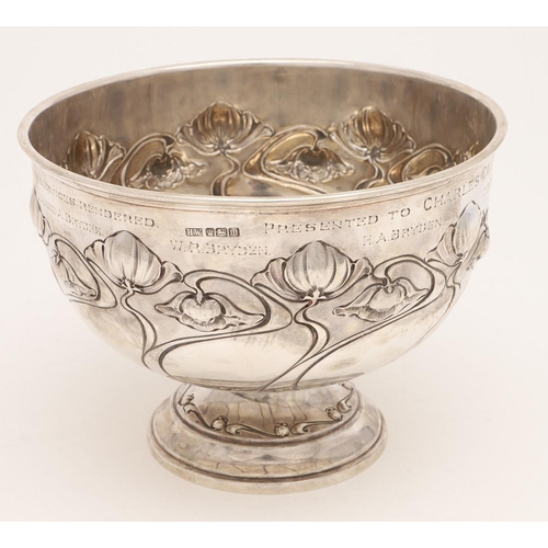 207 - AN EDWARDIAN ART-NOUVEAU ROSE BOWL. circular outline, decorated in relief with stylised flowers, wit... 