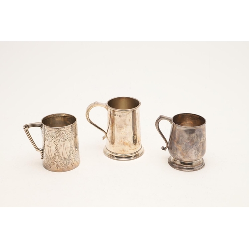 213 - THREE SILVER MUGS:-. a late 19th/ early 20th century Indian Colonial example, inscribed, by Hamilton... 