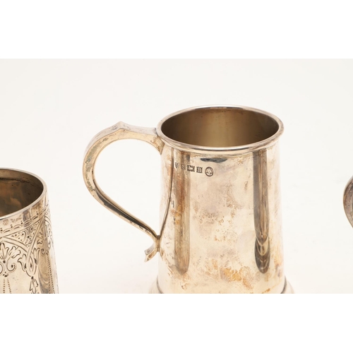 213 - THREE SILVER MUGS:-. a late 19th/ early 20th century Indian Colonial example, inscribed, by Hamilton... 