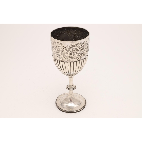 220 - A VICTORIAN TROPHY GOBLET. with bead borders, embossed & chased decoration and engraved around the c... 