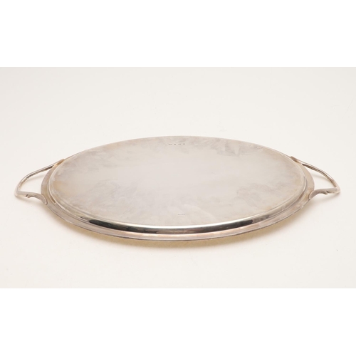 227 - A MODERN TWO-HANDLED TEA TRAY. oval outline, with bead borders, an engraved oval cartouche in the ce... 