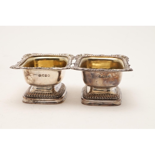 231 - TWO PAIRS OF GEORGE III SALTS. an oval pair, with reeded borders, makers mark worn, London 1792, a r... 