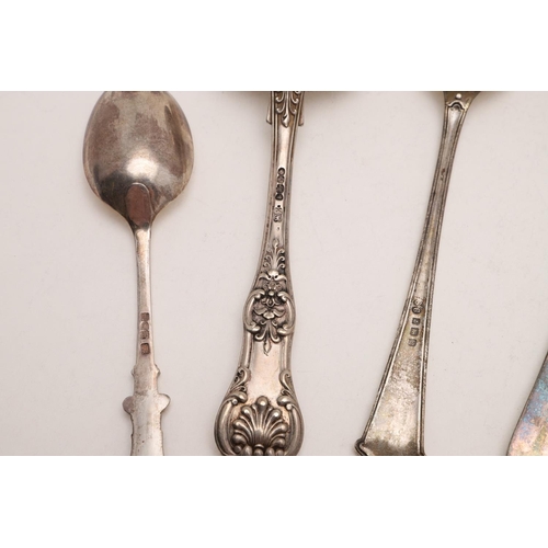 24 - MIXED FLATWARE:-. a Victorian parcelgilt spoon, by Robert Stebbings, London 1892, a Victorian Queen'... 