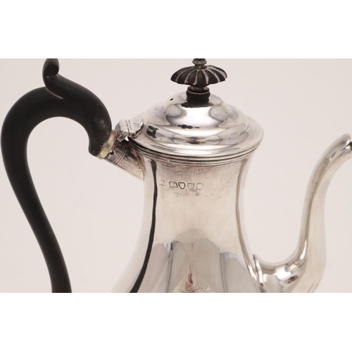 271 - A VICTORIAN BALUSTER COFFEE POT. with a fluted lower body, a scroll handle and a spreading circular ... 