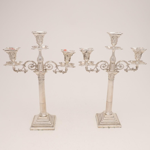 273 - A PAIR OF EDWARDIAN THREE-LIGHT CANDELABRA. in the form of Corinthian columns, with bead borders, le... 