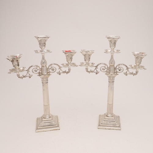 273 - A PAIR OF EDWARDIAN THREE-LIGHT CANDELABRA. in the form of Corinthian columns, with bead borders, le... 