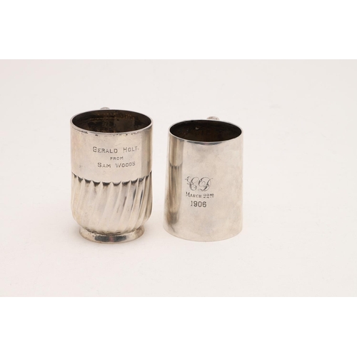 280 - TWO 20TH CENTURY SILVER MUGS. one with a fluted lower body and a collet foot, by William Hutton & So... 