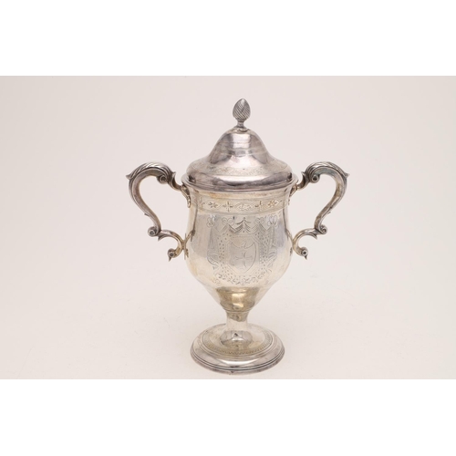 281 - A GEORGE III IRISH TWO-HANDLED CUP & COVER. with twin leaf-capped scroll handles, a bright engraved ... 