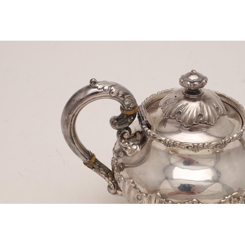 282 - A LATE 19TH/ EARLY 20TH CENTURY NORTH AMERICAN THREE-PIECE TEA SET. circular form, with embossed dec... 