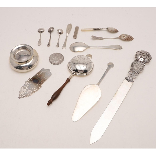 292 - A MIXED LOT. comprising of three various spoons, a strainer & matching base, a letter opener, a book... 