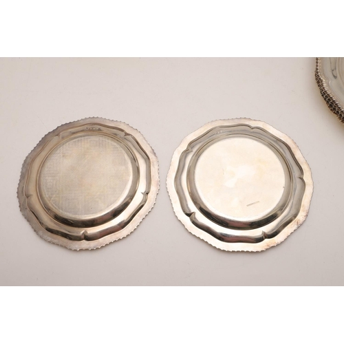 295 - AN ELIZABETH II SILVER PART-DINNER SERVICE. shaped circular outline and with gadrooned borders, cons... 