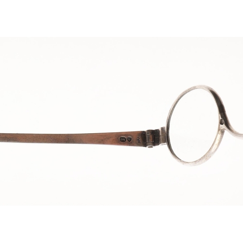 318 - A PAIR OF GEORGE IV FOLDING SPECTACLES. inscribed 