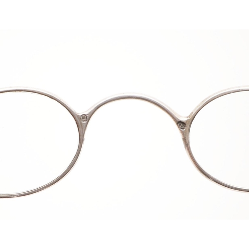 318 - A PAIR OF GEORGE IV FOLDING SPECTACLES. inscribed 