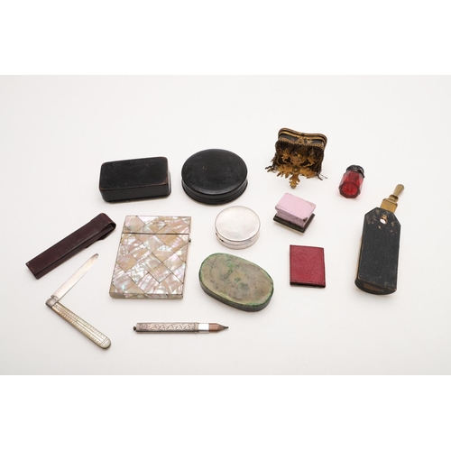 320 - A MIXED LOT. comprising of two papier mache snuff boxes, a wall pocket, a mother-of-pearl card case,... 