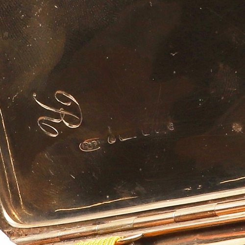 323 - A 20TH CENTURY 9CT. GOLD CIGARETTE CASE. rounded rectangular, with engine-turned decoration, the int... 