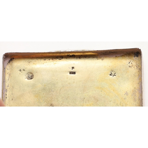 325 - A 19TH CENTURY AUSTRIAN PARCELGILT SNUFF BOX. rectangular form, the cover with a raised panel, decor... 